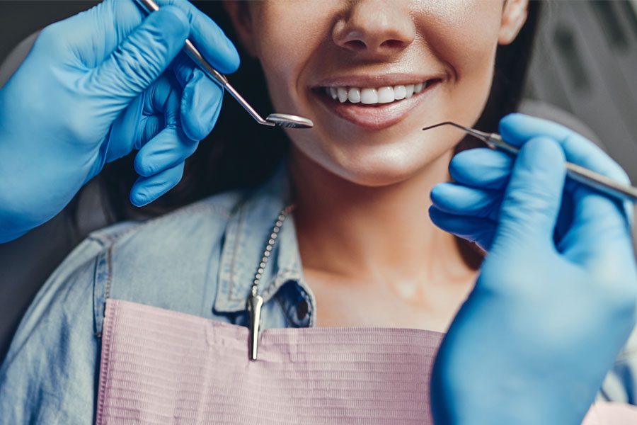 Individual Dental Insurance - Woman Getting Her Teeth Cleaned